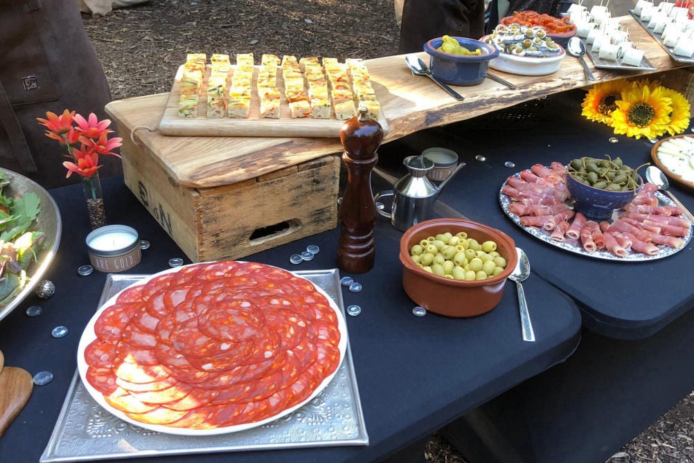 BBQ, paella, tapas, sandwiches, and various catering options are available at The Gathering.